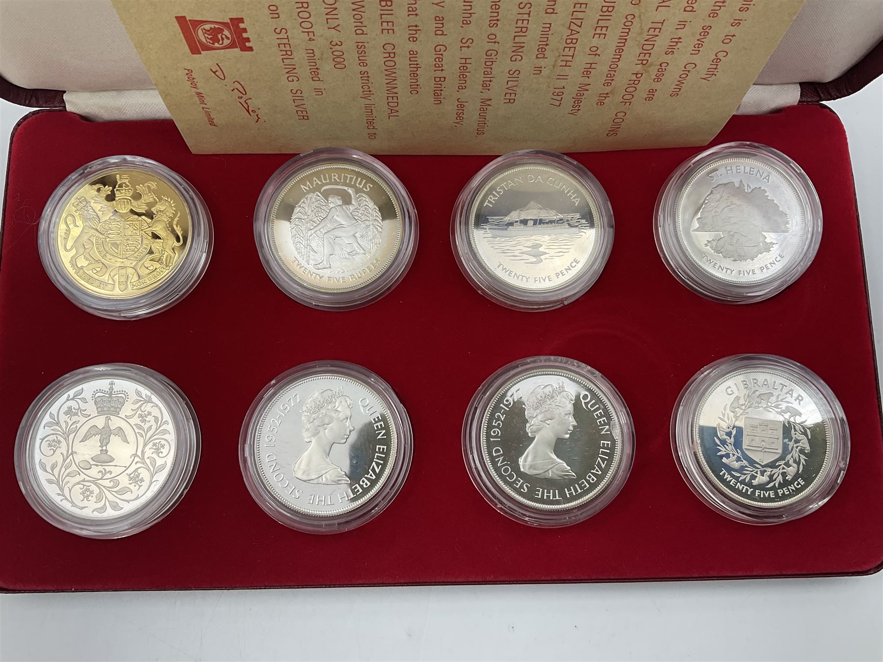 Pobjoy Mint sterling silver proof seven crown coin and gold plated sterling silver proof 'Silver Jubilee Crownmedal' set, commemorating the 'Silver Jubilee of Her Majesty Queen Elizabeth II 1977', cased with certificate
