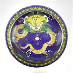 20th century Chinese Cloisonne bowl with inverted rim, centrally decorated with a Dragon on blue ground, four figure character mark beneath, D25cm 