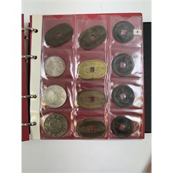 Mostly Japanese coins, including modern year date denomination runs, various cash coins, some fantasy or reproduction coins etc, housed in two ring binder folders