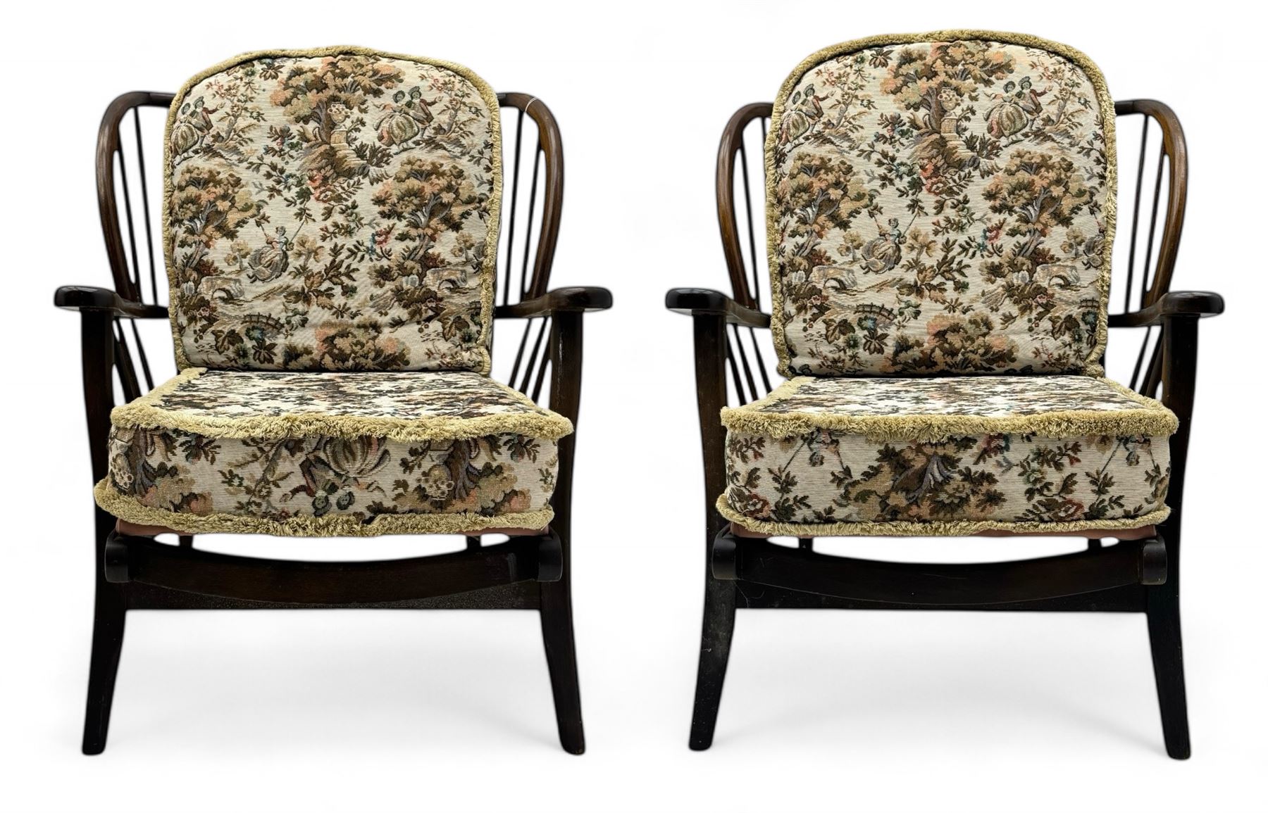 Joynson Holland - pair of mid-20th century stained beech framed easy chairs, shaped back and flat armrests over floral tapestry cushioned seat and back, on splayed supports united by stretcher