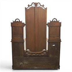 Edwardian figured walnut dressing chest, with central tilting mirror with pierced fret work, flanked by cabinet with figured walnut panelled door above a trinket drawer, with four short over a long long drawer, raised on a plinth base with castors 