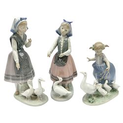 Three Lladro figures, comprising Hurry Now no 5503, Josephine feeding Duck no 5201 and Aracely with Pet Duck no 5202, all with original boxes, largest example H25cm