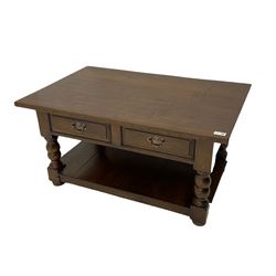 Solid oak coffee table, fitted with two drawers and under-tier