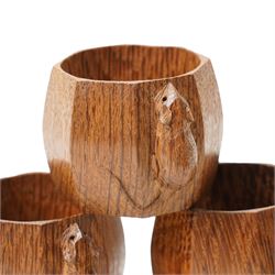 Mouseman - set of six oak napkin rings, with carved mouse signature, by the workshop of Robert Thompson of Kilburn