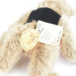 Three limited edition Robin Rive teddy bears, to include 'Charlie' a mottled grey mohair bear with brown suede pads limited edition no.24/200, 'Tim' a blonde mohair bear with orange felt waistcoat limited edition no.137/300 and one other in sequined waistcoat, two with certificate tags, tallest H48cm