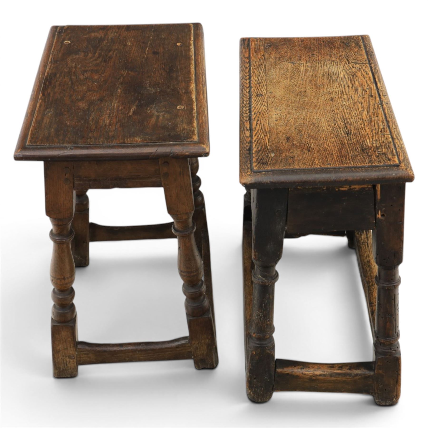 Two 19th century oak joint stools raised on turned supports united by stretchers