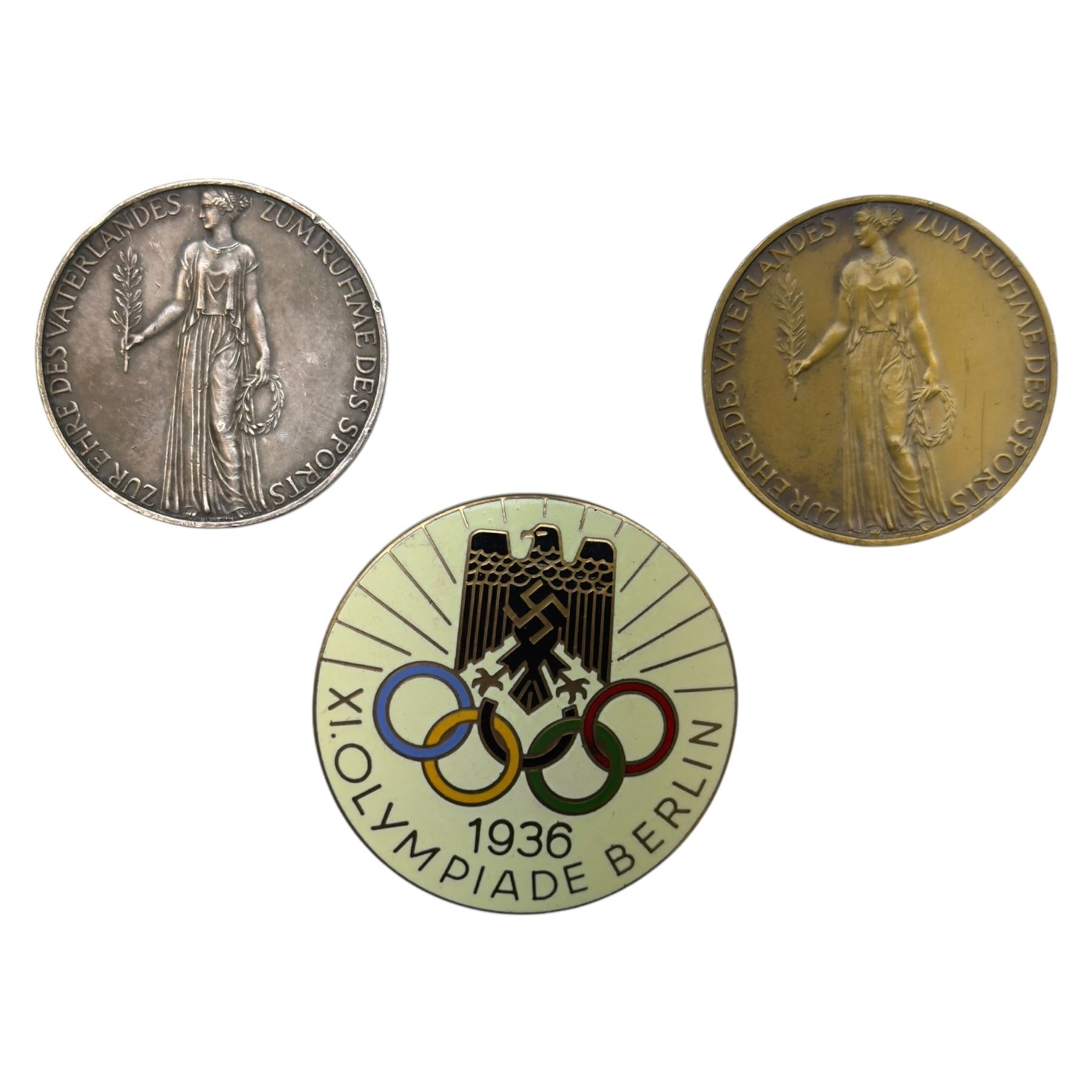 Olympic Badge Berlin 1936, the enamel badge marked H. Osang Dresden to verso and two Commemorative medals, the edge engraved 'Bayer. Hauptmunzemt. Feinsilber'