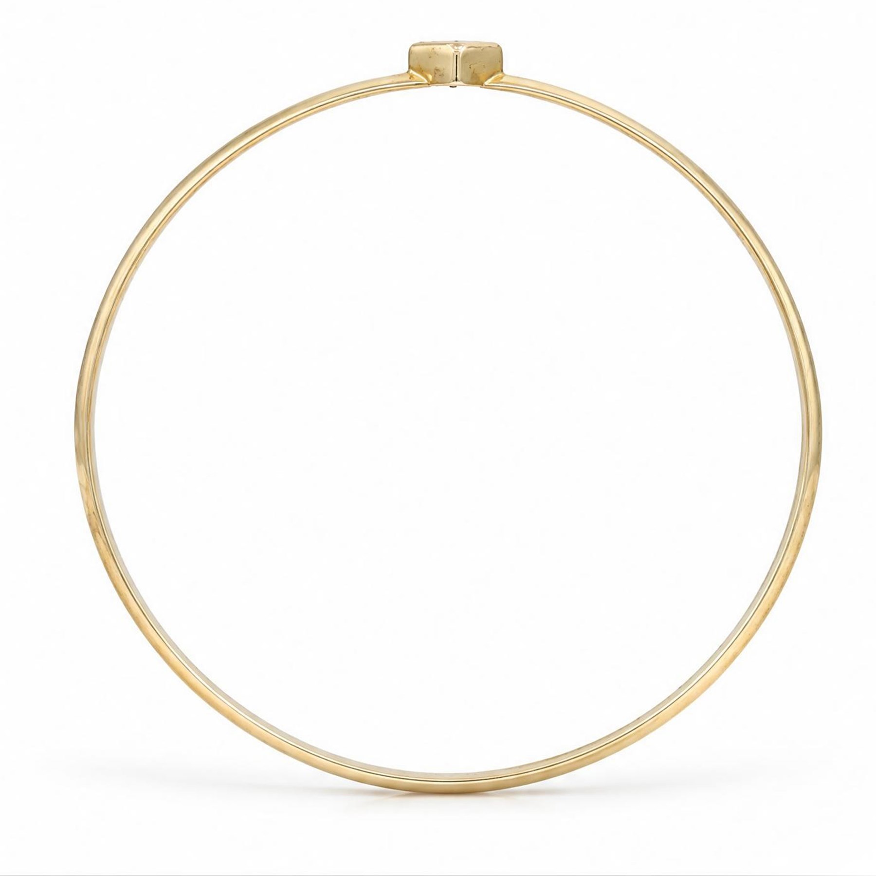 18ct gold fancy champagne / brown diamond bangle, bezel set with a single princess cut diamond of approx 0.70 carat, stamped 750