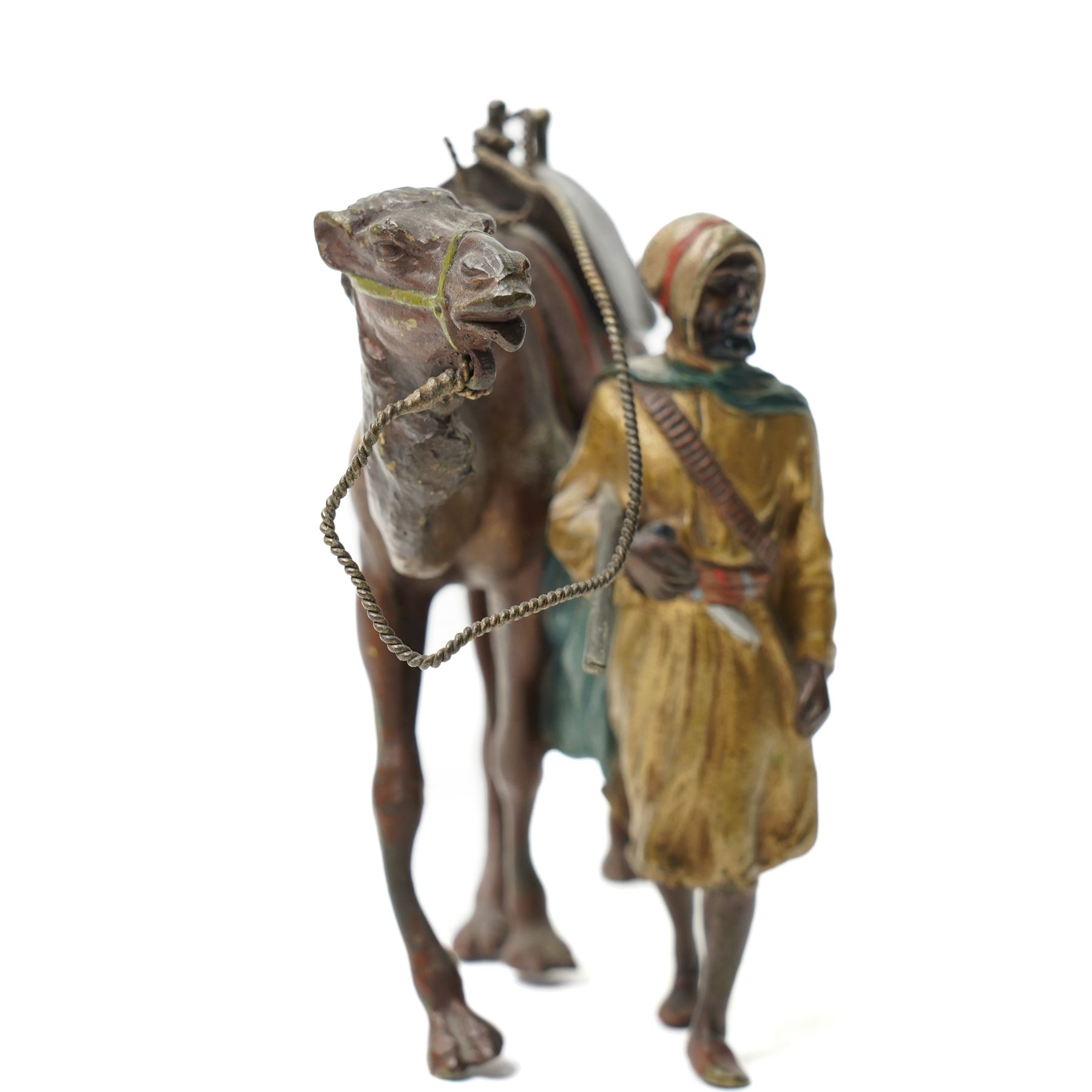 After Bergmann - Austrian School (20th Century) cold painted bronze of a Bedouin leading a camel L16cm
