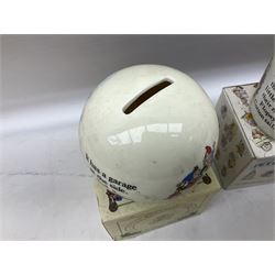 Royal Doulton Bunnykins nursery set in box and two cups, together with two Wedgwood Peter Rabbit mugs and Royal Staffordshire Noddy money box and cup (7)