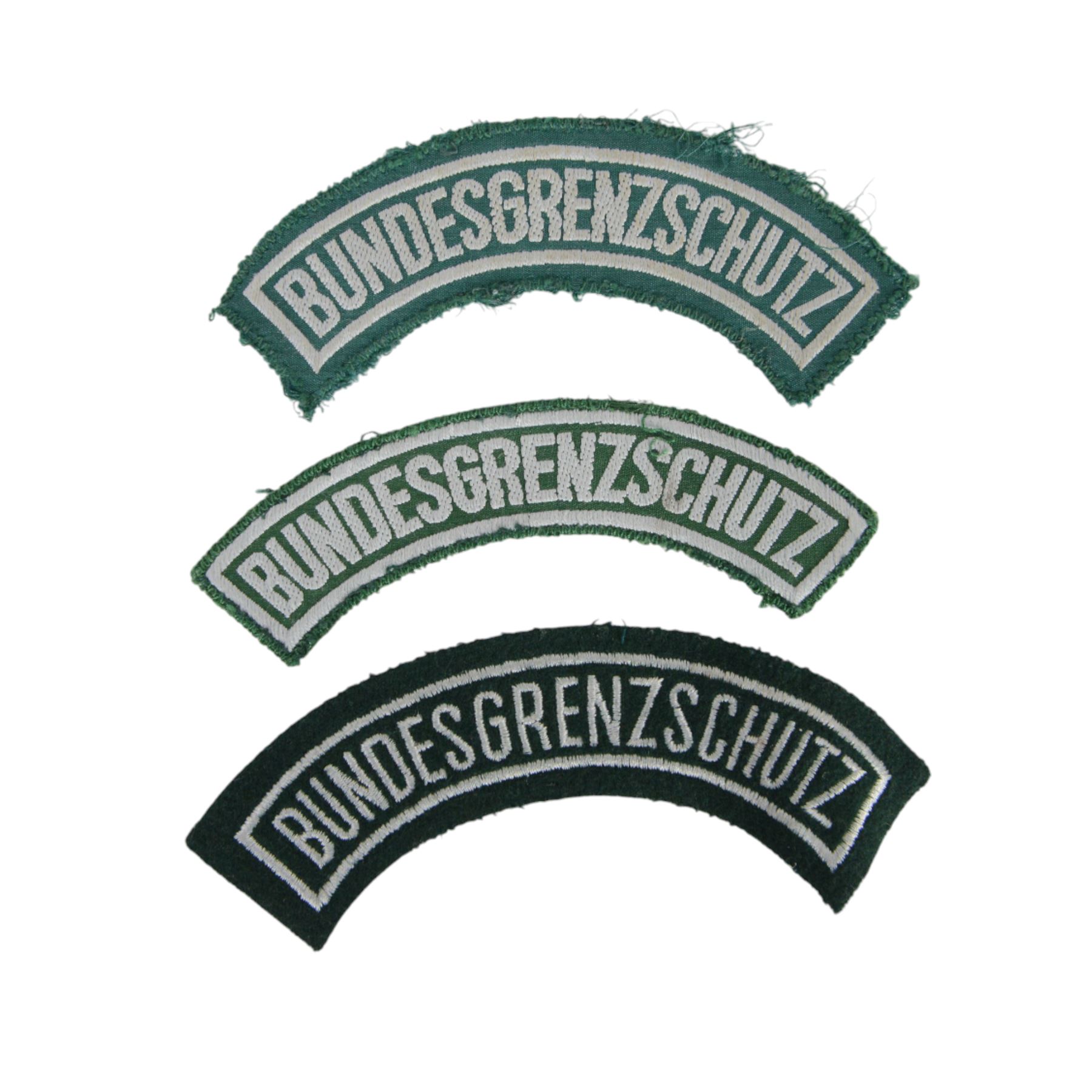 West German Bundeswehr military badges for army, navy and airforce, together with army lanyard
