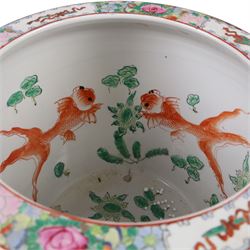 20th century Chinese famille rose fishbowl, decorated with birds in foliage, on hardwood stand, H43cm