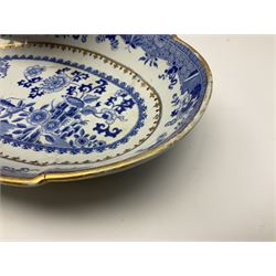 Early 19th century Spode dessert set, circa 1805-1830, blue and white transfer printed in the Grasshopper pattern, comprising comport of oblong form with twin naturalistically modelled branch handles, two oval dishes, and six plates, each with blue or green printed mark beneath, including handles comport H11.5cm W34cm, oval dishes W26.5cm, plates D20.5cm