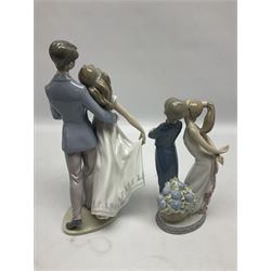 Two Lladro figures, comprising Now & Forever no 7642 and Kiss & Make Up no 5555, largest example H28cm
