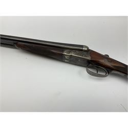 Harrods Ltd. Brompton Road London (Retailer) 12-bore side-by-side boxlock non-ejector sporting gun, 75cm barrels, walnut stock with chequered grip and fore-end and thumb safety, serial no.015, L118.5cm overall SHOTGUN CERTIFICATE REQUIRED