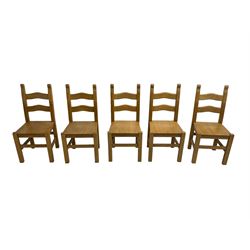 Set ten (8+2) beech dining chairs, waived ladder backs raised on square supports united by stretchers
