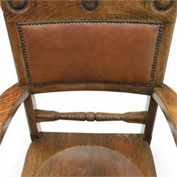 Arts and Crafts oak open armchair with dished seat