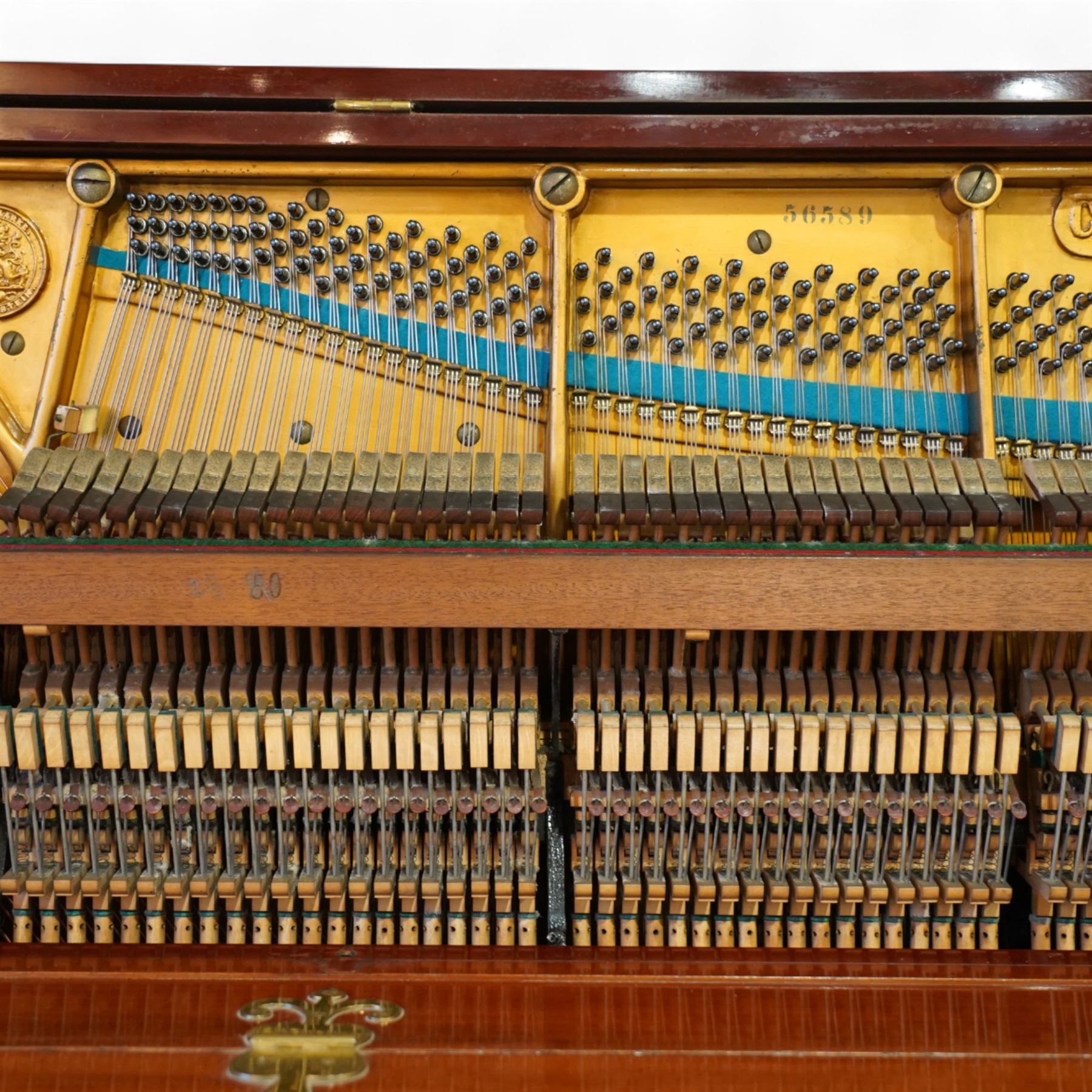 Claud Bechstein- German model IV overstrung upright piano in a mahogany Arts & Crafts designed case by Walter Cave, Serial number 56589 (1900-01), with a lattice music desk and silk backed open fretwork, square key fall with makers name and crafted brass hinges, two candle sconces on tapered square supports, makers name and model number cast into the frame, with an underdamper action, una-corda and sustain pedals, recently re-strung with new tuning pins, responsive action and damping, in very good playing condition, with 85 ivory and ebony keys A0-A7, tuning A=440. Including a period duet stool with a velvet-padded top.
Walter Cave was a leading architect, interior designer, and furniture maker during the Arts & Crafts period, a similar piano to this was owned and played by George Bernard Shaw and is on exhibition at the National Trust property, Shaw's Corner (Hertfordshire).

This item has been registered for sale under section 10 of the APHA Ivory Act, Reference 8P3C9UKA
