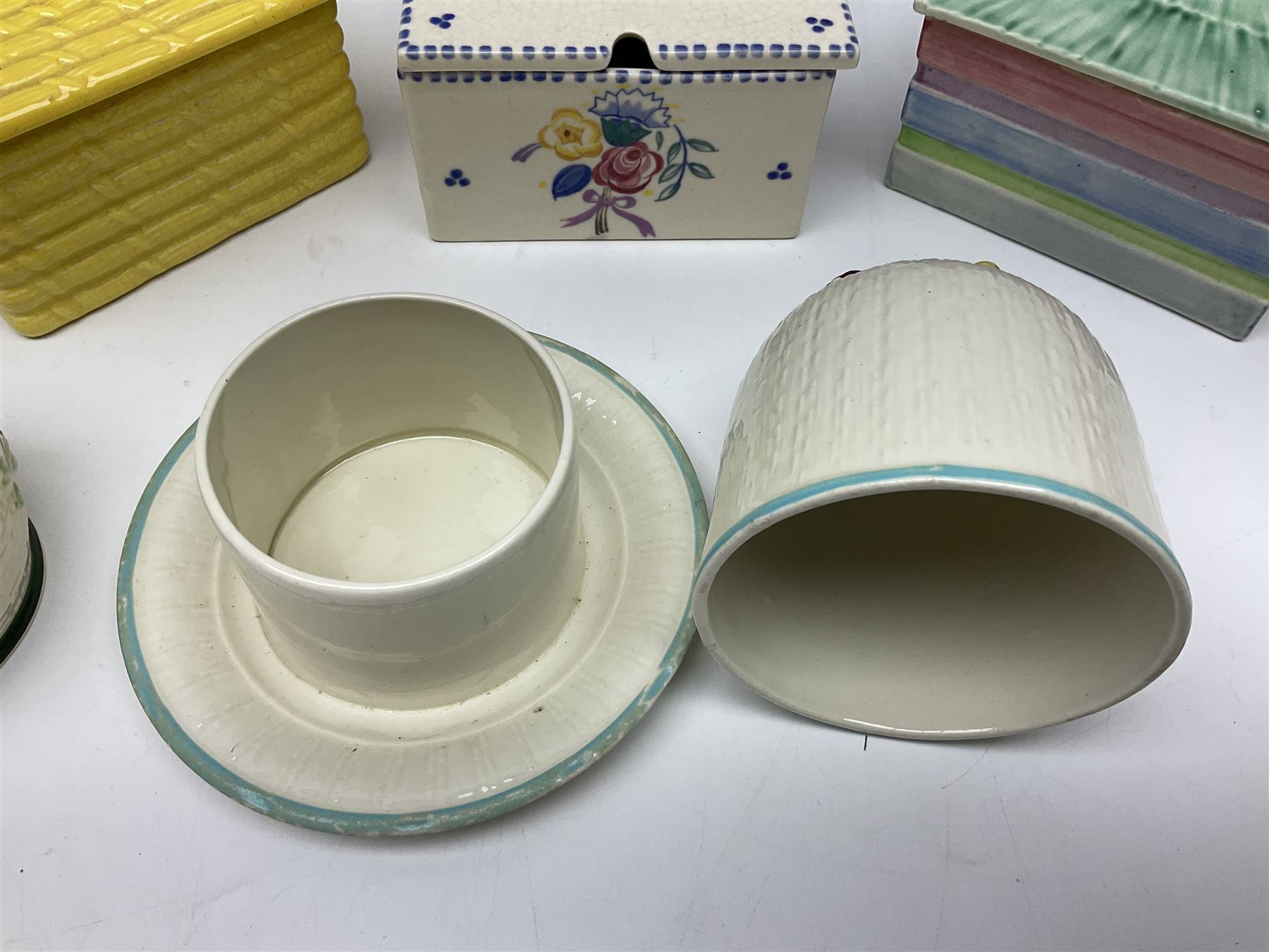 Clarice Cliff for Wilkinson Ltd Crocus Bizarre beehive honeypot painted in the Crocus pattern, together with two beehive Beswick honey pots, Poole square honey pot etc (14)