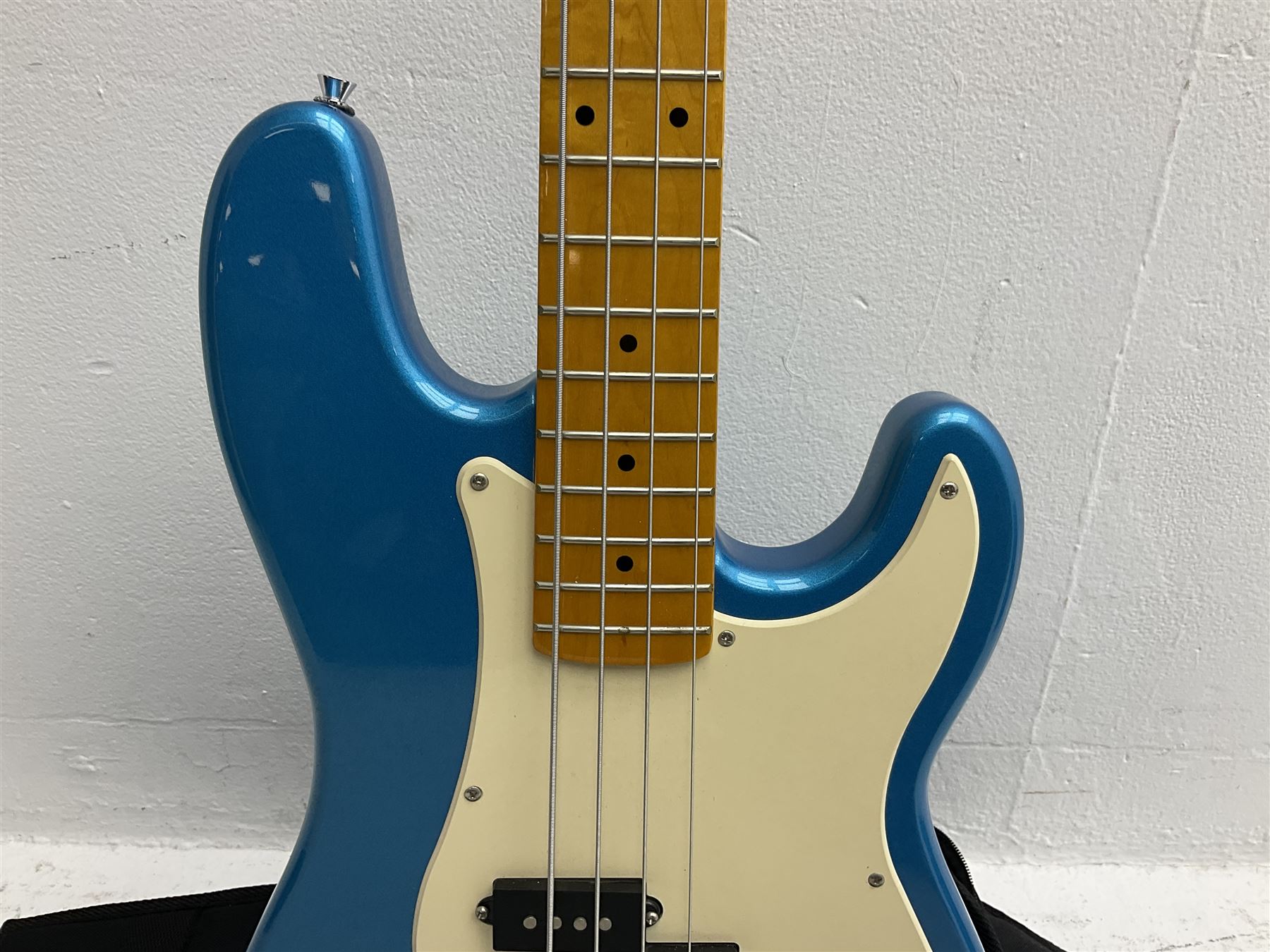 Richwood electric bass guitar in blue, cream and natural finish L117cm; in Fender soft carrying case; together with Behringer Thunderbird Bx108 amplifier date code 0 4 11.