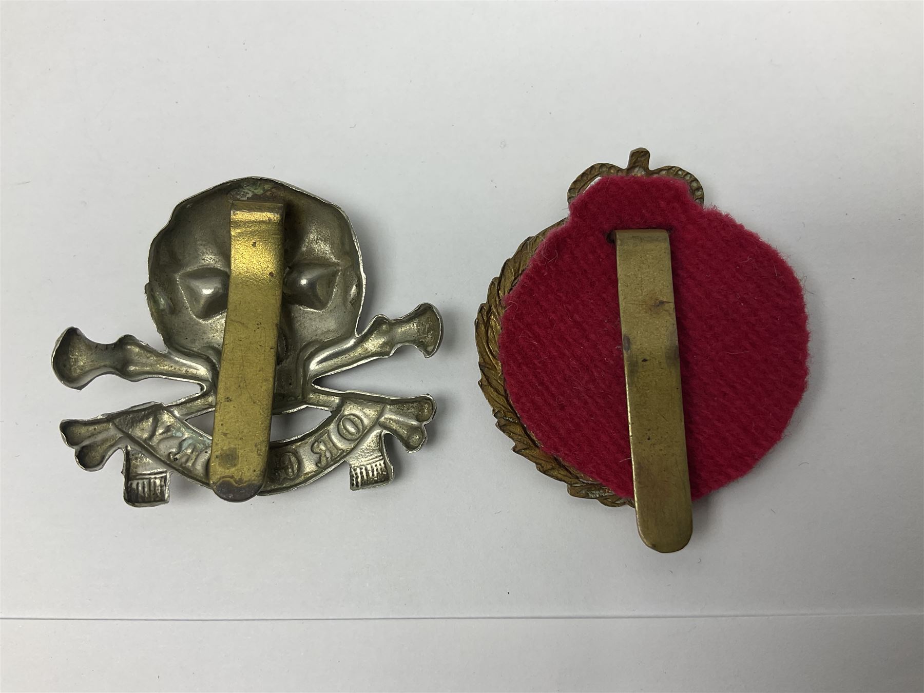 Nine Lancers metal cap badges including 9th, 12th Royals, 24th, 16th Queens and 17th; together with eight various Guards/Dragoons badges (17)