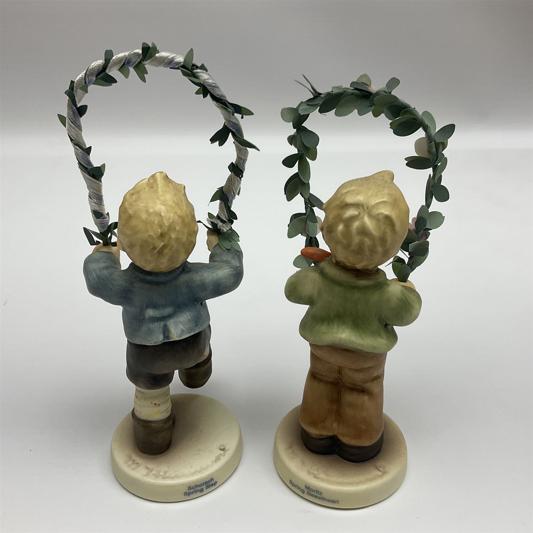 Hummel by Goebel, Sounds of Spring collectors set, eleven piece set comprising  turntable maypole stand, two smaller stands and eight figures, maypole stand H27