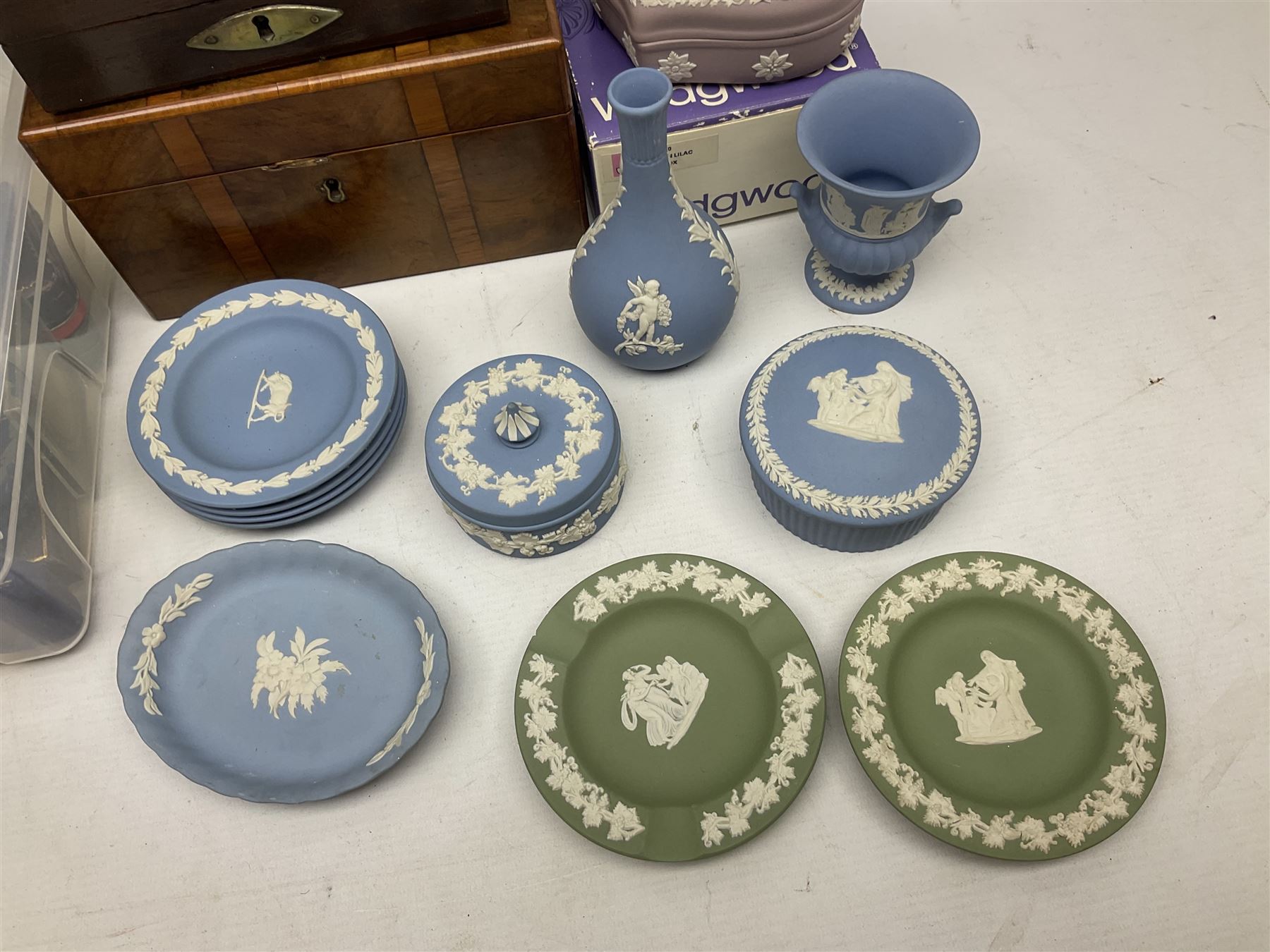 Wedgwood Jasperware to include lilac trinket box with original box, light blue vases, trinket dishes, boxes etc, together with a walnut box, coins and other collectables 