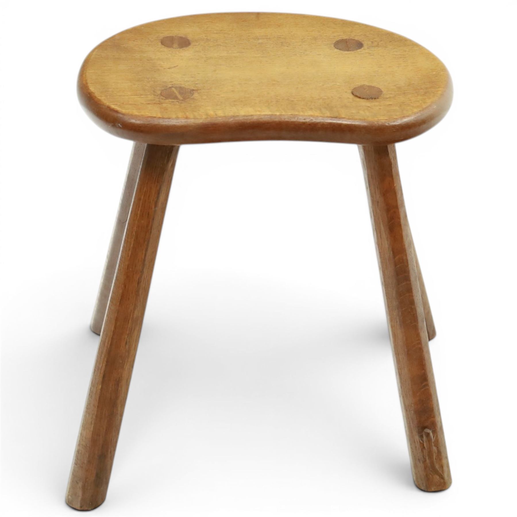 Lizardman - oak milking stool, shaped top with four octagonal supports with carved lizard signature by Derek Slater of Crayke