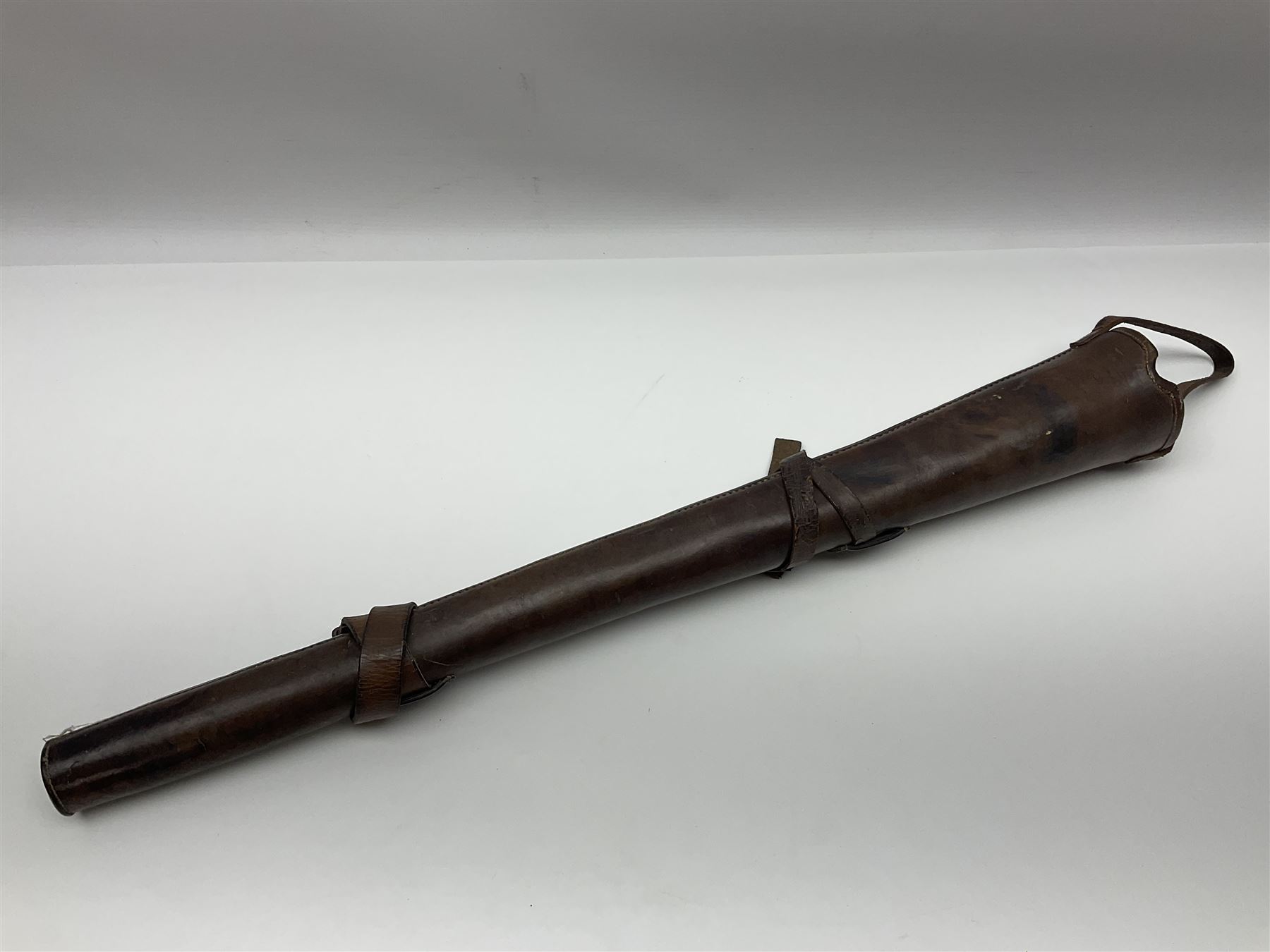 19th century telescopic hunting horn, the bell engraved 'The Beaufort', with makers mark Kohler & Son, makers, 61 Victoria Street, Westminster (from Covent garden) London, in a leather sheath, horn full extended L91cm 