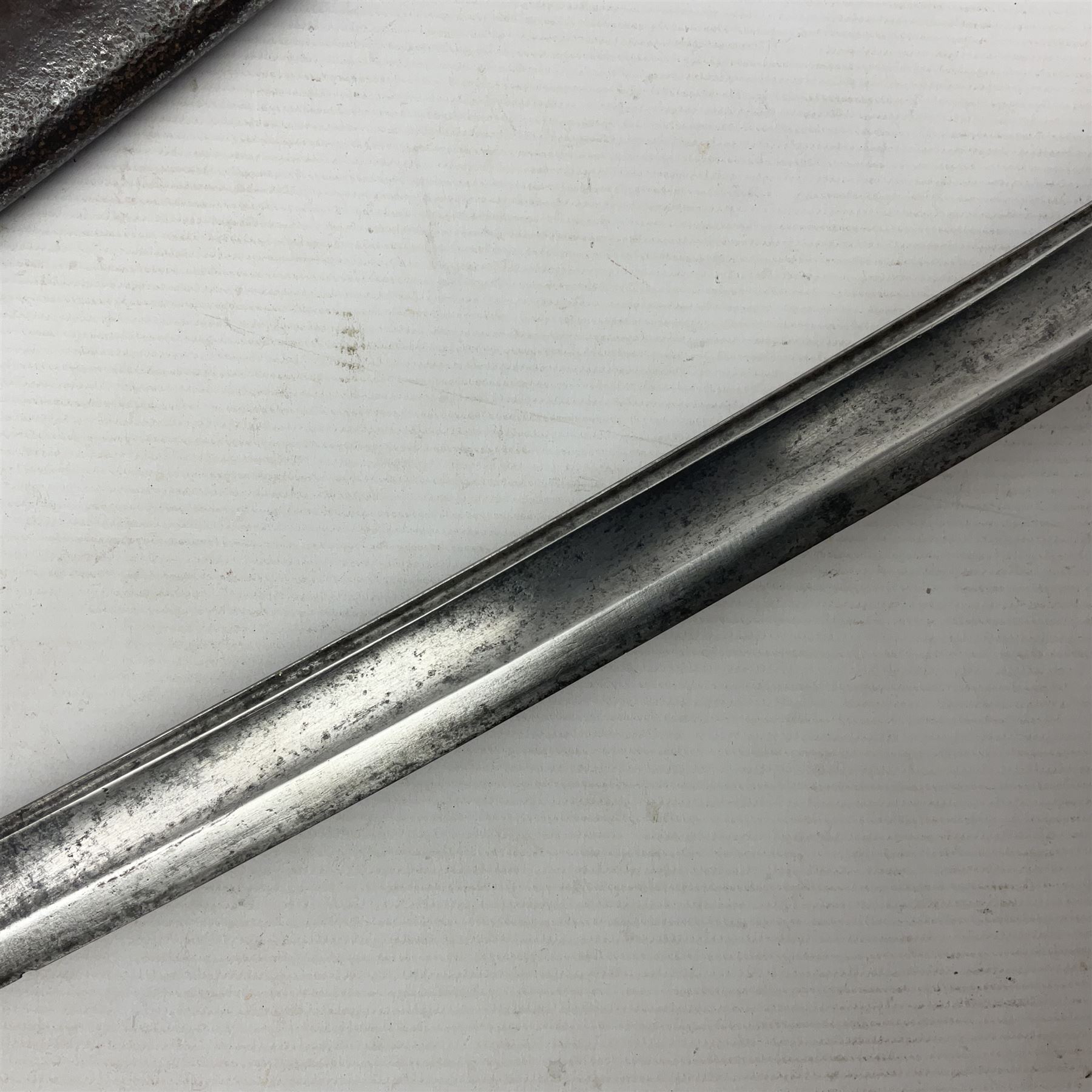 19th century French 1822 Pattern Light Cavalry trooper's sword with 88.5cm slightly curving fullered blade, brass three-bar hilt and wire-bound leather grip; in polished steel scabbard with two suspension rings L110.5cm overall