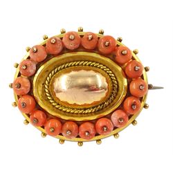Victorian 9ct gold coral brooch, with glazed locket back