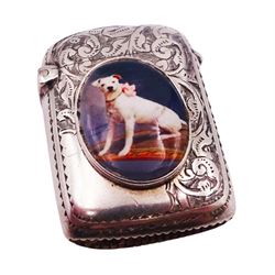 Victorian silver vesta case, of rounded rectangular form engraved with foliate scrolls, the front with applied oval enamel panel depicting a seated dog with pink bow to collar, hallmarked Minshull & Latimer, Birmingham 1895, H3.5cm, approximate gross weight 0.59 ozt (18.3 grams)