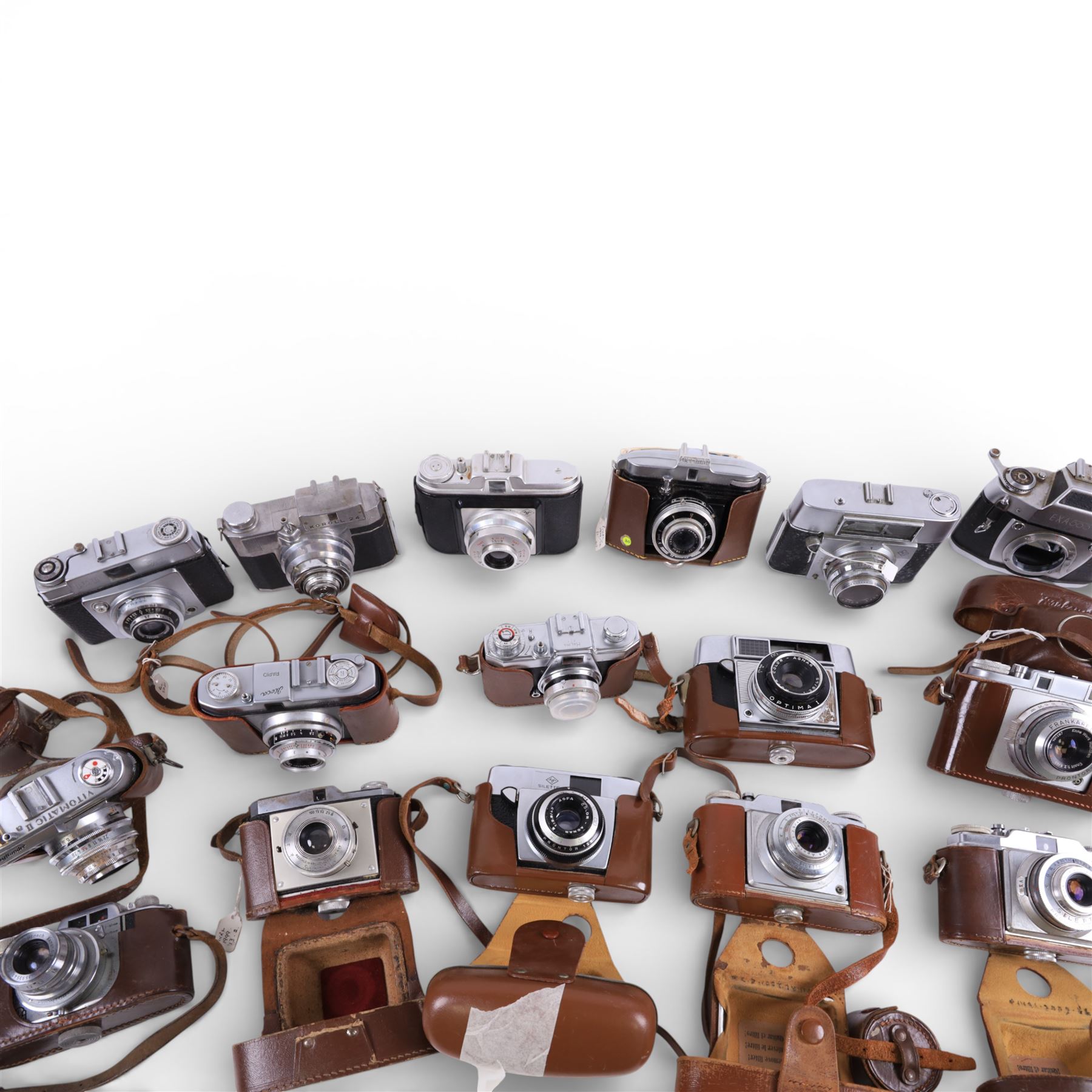 Collection of rangefinder cameras, including Aka Rette, Agfa Silette, Iloca Rapid, Koroll 24, Ilford Sportsman, Exa 500, Luxette, Frankarette, Agfa Optima I, Halina Pet,  Voigtlander Vitomatic II