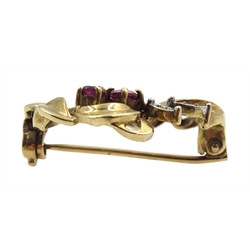 9ct gold ruby and diamond circular bow brooch, hallmarked and a gold sapphire and diamond ring stamped 18ct