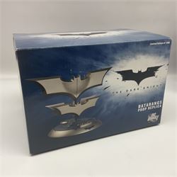 Two Batman replica Batarangs comprising DC Comics QMX Caliber Metalworks 1:1 scale replica with original box, and DC Direct The Dark Knight prop replica no. 33/1500 with original box and certificate of authenticity 