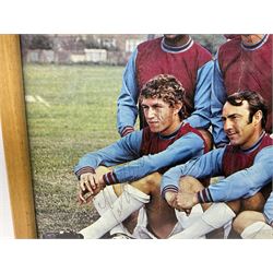 1970-1 photograph of West Ham United FC squad members, including Bobby Moore, Geoff Hurst, Harry Redknapp, Trevor Brooking, Jimmy Greaves, Billy Bonds etc, most players with signatures, 30 x 45cm, framed and glazed
