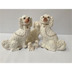 Pair of Staffordshire style spaniels and others similar