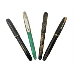 Four fountain pens, including a Parker Duofold, three with 14ct gold nibs and one 18ct gold plated