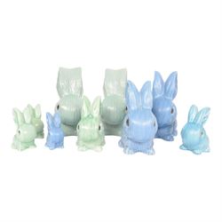 Nine Sylvac rabbits, including models 1028, 990, 1026 etc, in blue and green, largest H25cm  