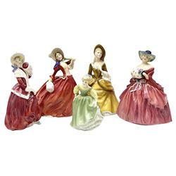 Royal Doulton figures, comprising Autumn breeze HN1934, Genevieve HN1962, Christmas Morn HN1992, Sandra HN2275 and Fair Maiden HN2211. 