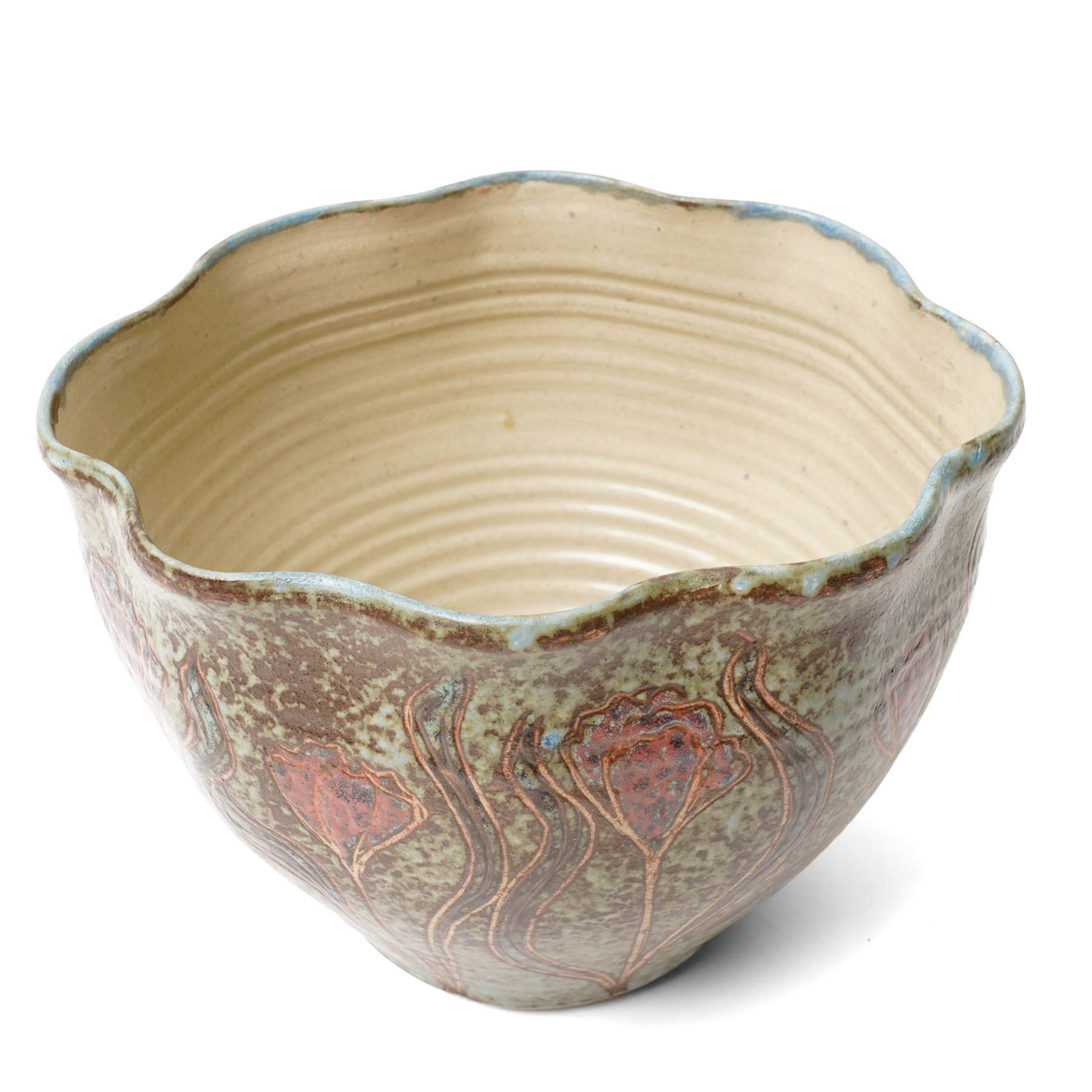 John Egerton (c1945-2024): Stoneware planter, decorated with carved flower motif, mottled blue background and scalloped rim, marked beneath, H18cm
