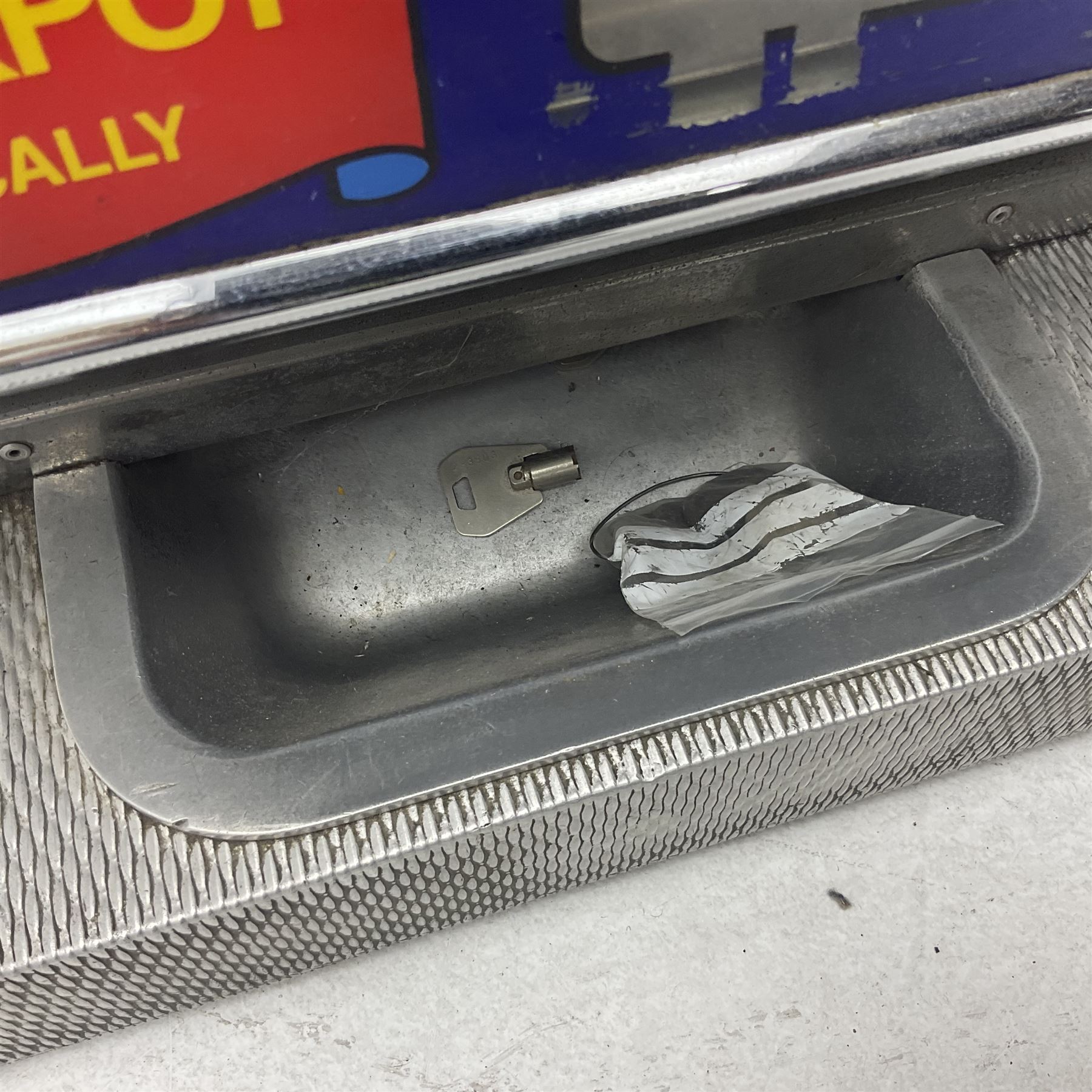 Aristocrat Nevada Lucky Strike one-armed bandit arcade machine, circa 1964, light-up display in aluminium and stainless steel case, with keys, H72cm 