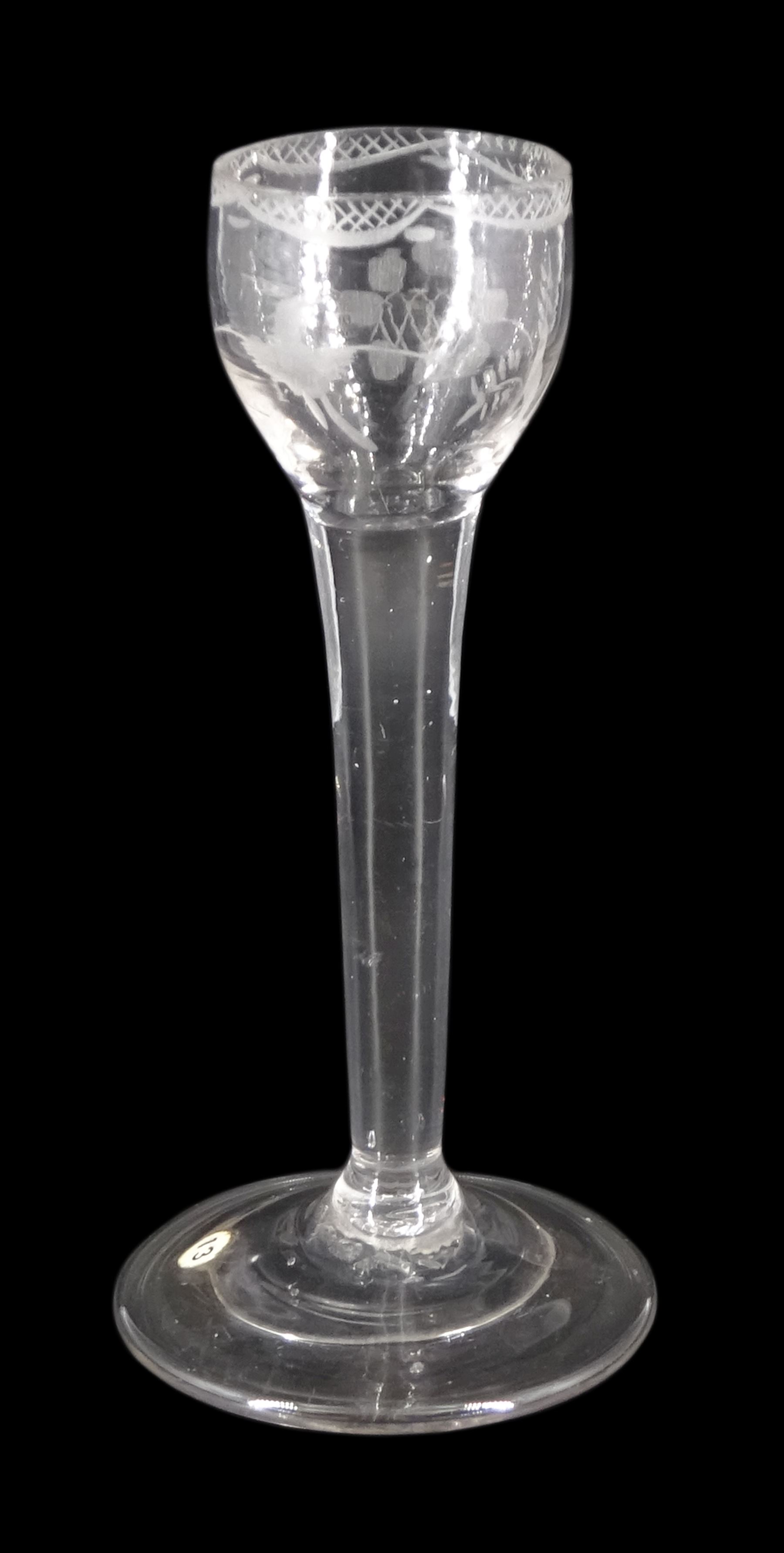 18th century cordial glass of possible Jacobite interest, the ogee bowl engraved with bird in flight and sunflower, upon a plain stem and folded conical foot, H15cm