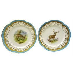  Pair late Victorian Minton shaped dessert plates hand painted with a family of Deer by Henry Mitchell within a border of gilt beaded swags, floral roundels and crosshatched panels with turquoise rim c1870 pattern no. G154, D24cm (2) Provenance Property of Bob Heath, Brandesburton Formerly of Ravenfield Hall Farm near Rotherham  