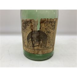 Chateau Paulet cognac green glass bottle, with blue ceramic stopper and paper label bearing 'Chai de Reserve Du Chateau Paulet' 'Datant De 1762 Jarnac Pres Cognac', H48cm