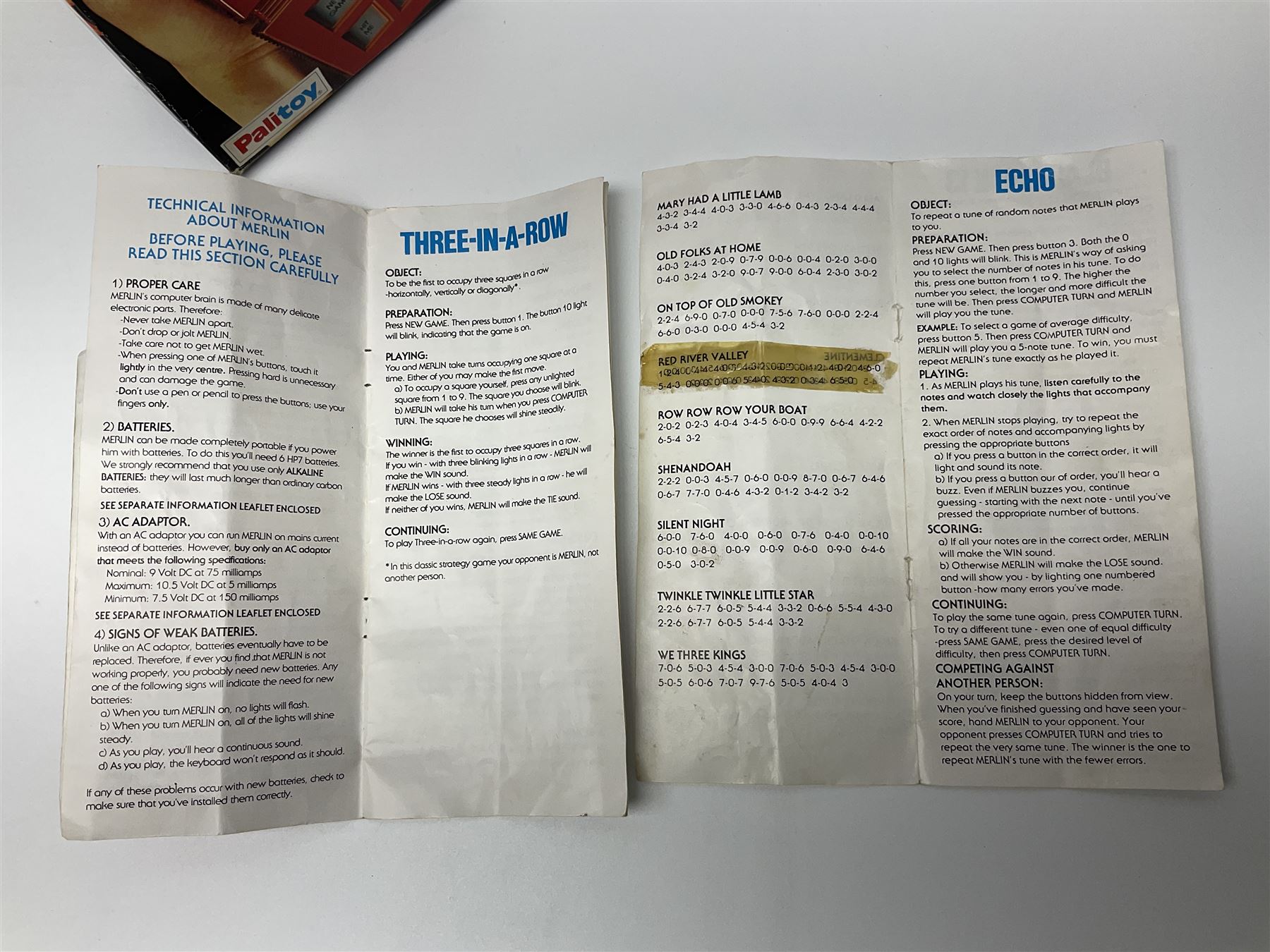Three late 70s/early 80s handheld electronic games; Bandai Electronics Arcade ‘Gunfighter’ (1980), Grandstand ‘Invader From Space’ (1980), Palitoy ‘Merlin The Electronic Game Machine’ (1979) with game sheet and instruction booklet, all with original boxes (3) 