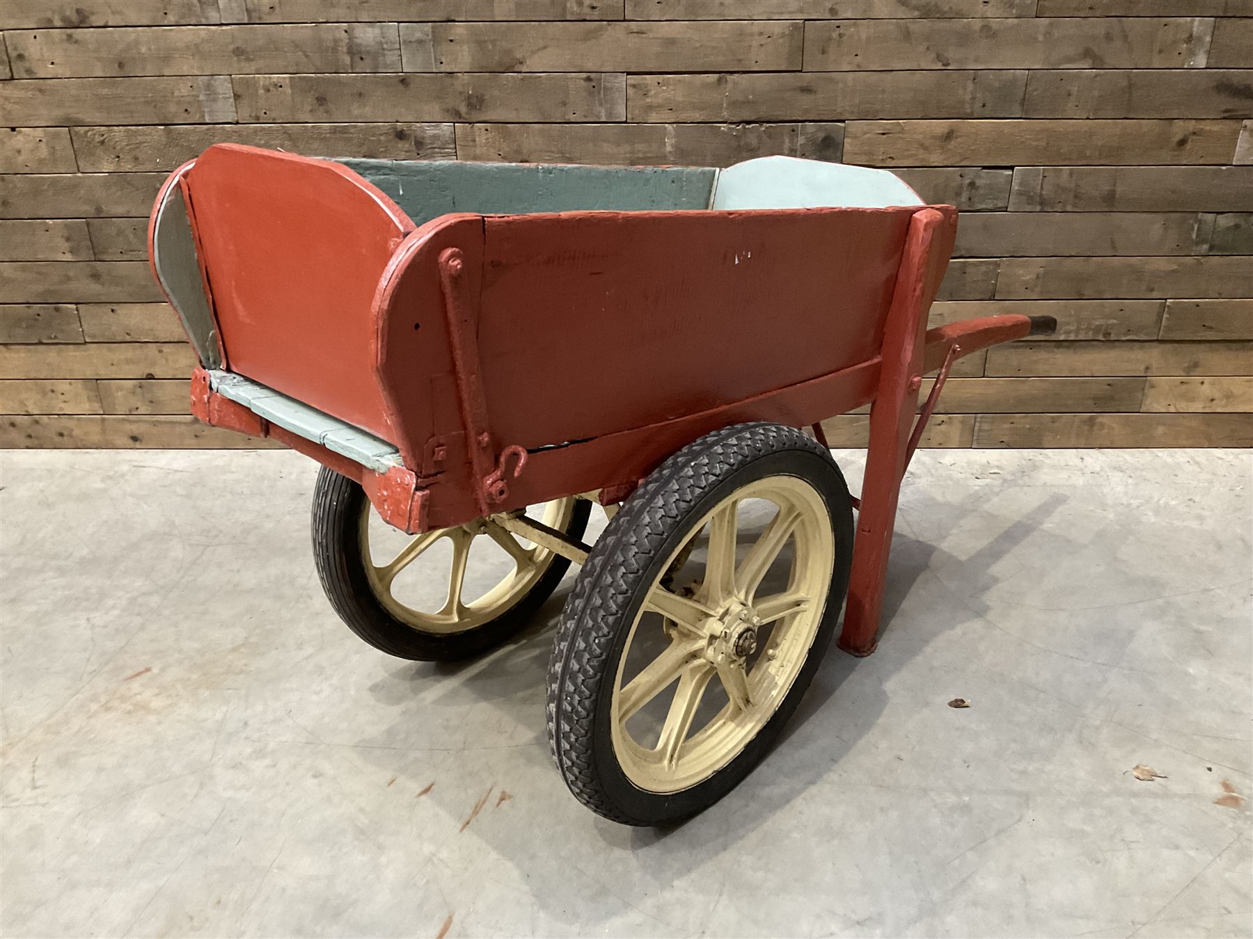 Painted timber hand cart on cast iron wheels