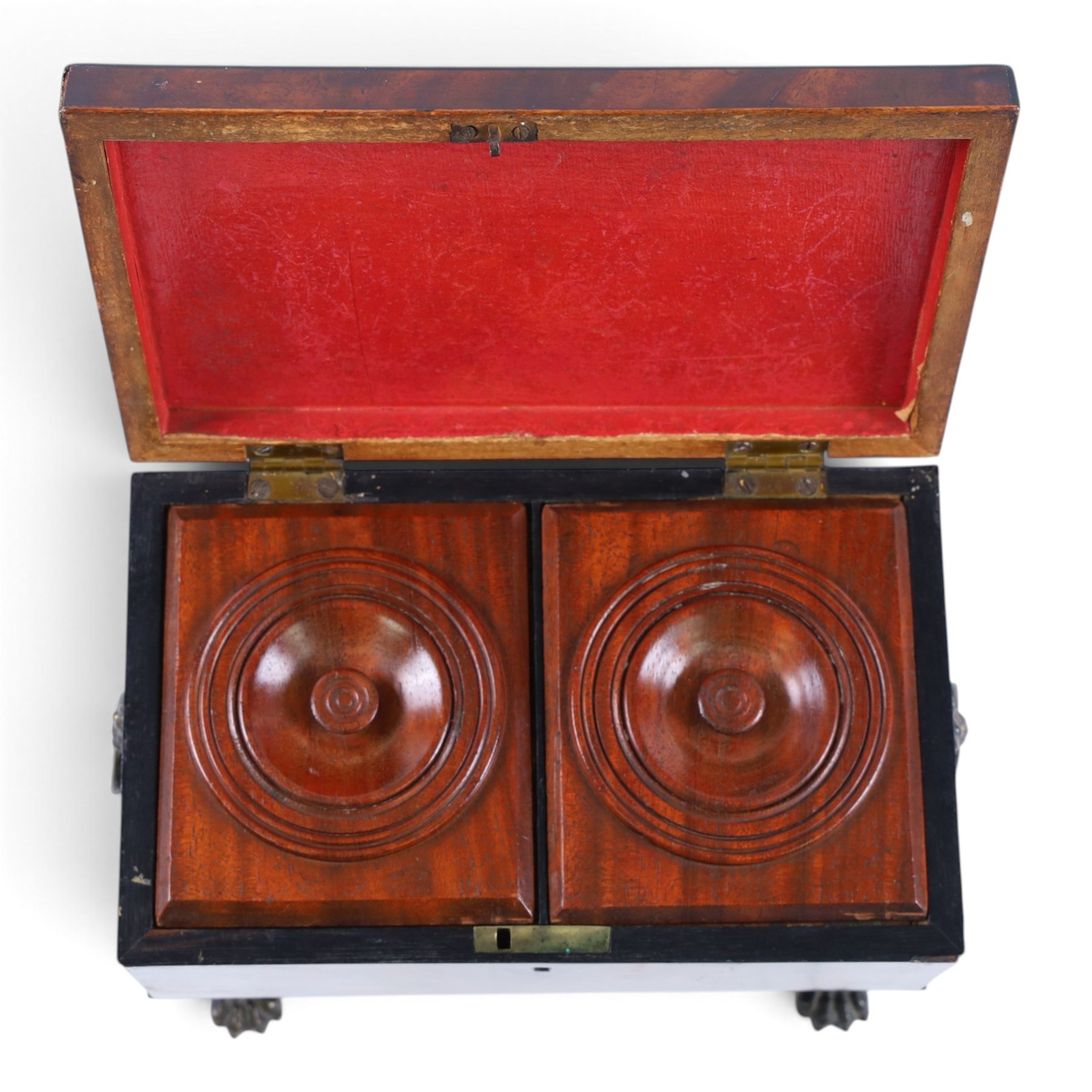 Regency mahogany sarcophagus tea caddy, the hinged lid opening to reveal two compartments, upon paw feet, H18cm