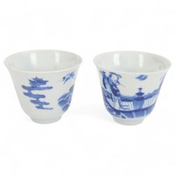 Pair of Chinese blue and white tea bowls, one with cover and four saucers, depicting two figures on a boat at sea, tea bowl H7cm