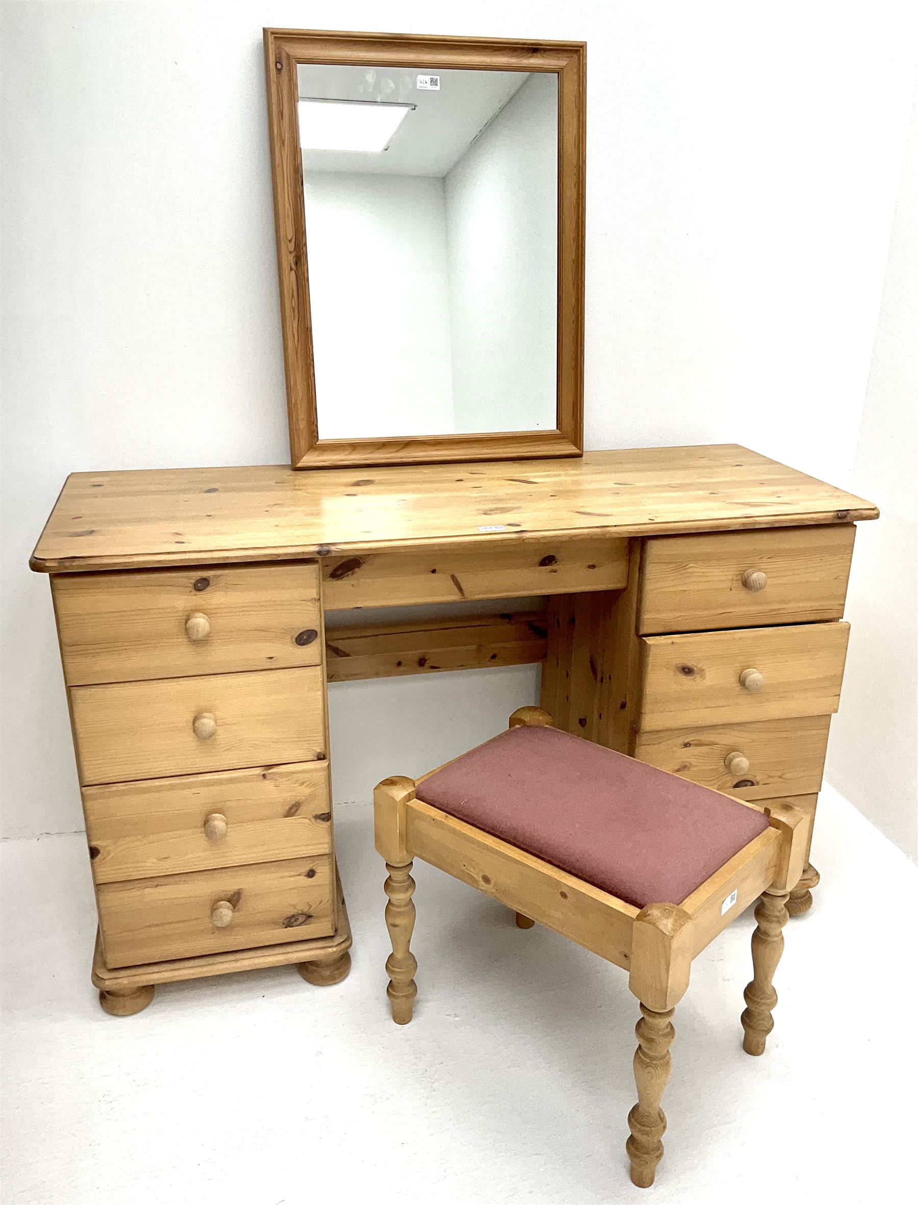 Solid pine twin pedestal dressing table, eight drawers, turned supports